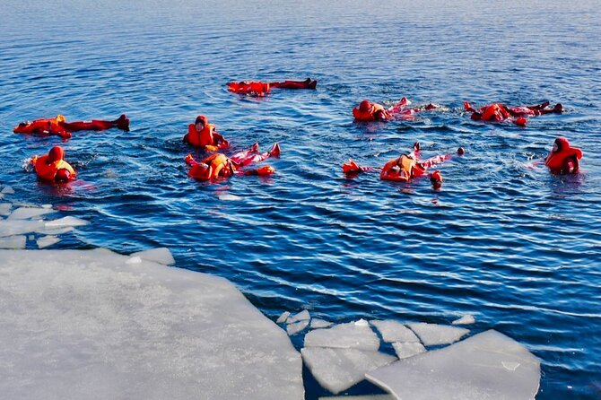 Arctic Ice floating in Puumala - The safety briefing and waterproof suit fitting that actually matter