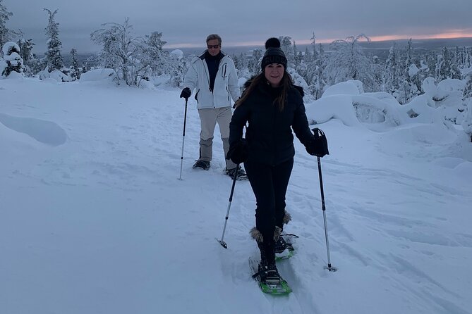 Arctic Reindeer Farm Experience with Snowshoeing in the Wild - Snowshoeing on a frozen lake: quiet views and real winter walking