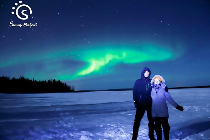 Aurora Borealis Trip in Lapland Lakeside - Campfire comfort at the lakeside: snacks, sausages, and warm berry juice