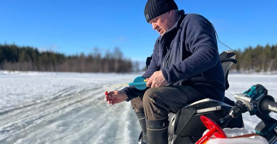 Authentic Reindeer Experience, Ice Fish & Lunch in the Wild - Ice fishing for perch on a private lake