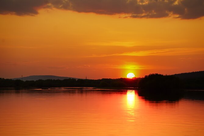 Canoe Tour under the Midnight Sun & Sunset from Rovaniemi - Weather and light: the calm skill of choosing the right moment