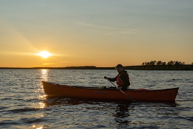 Canoe Trip in Lapland from Rovaniemi - The snack stop with hot drinks, plus a little extra warmth