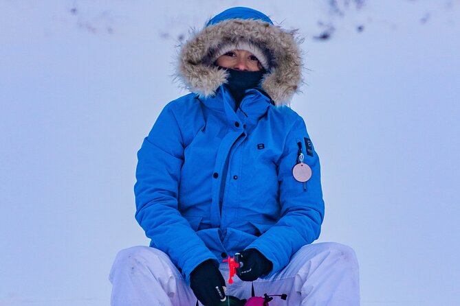 First Ice Fishing Experience in Rovaniemi - Snacks around the fire: the warmth you will actually feel