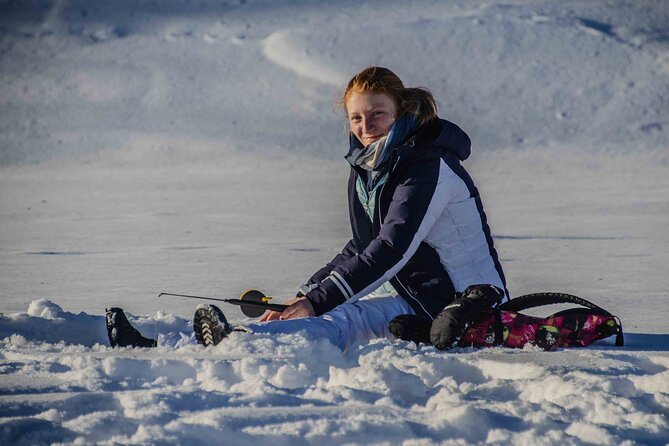First Ice Fishing Experience in Rovaniemi - Drilling your first hole: the moment it clicks