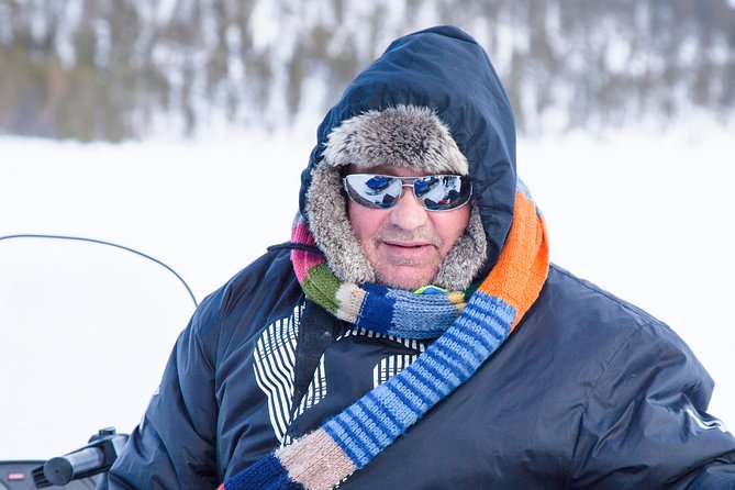 From Ivalo: Ice Fishing Safari to Lake Inari, reindeers & lunch - Snowmobile-Drawn Sleigh Ride: A Slow, Scenic Transition to the Lake