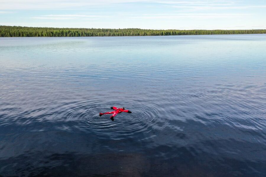 From Rovaniemi: Midnight Sun Forest Lake Float - Floating on a Pure Forest Lake Under a Never-Setting Sky