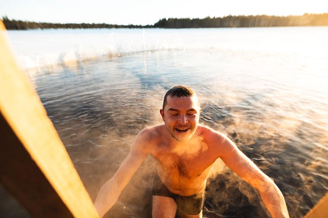 Full Day Lapland Tour, including Lunch and Dinner - Cottage time: warm recovery and salmon cooked over an open fire