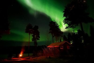 Glass Igloo Campfire Dinner under Northern Lights