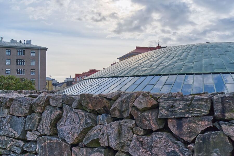 Helsinki: Temppeliaukio Church Entrance Ticket - The altar wall and the Ice Age detail you can actually grasp