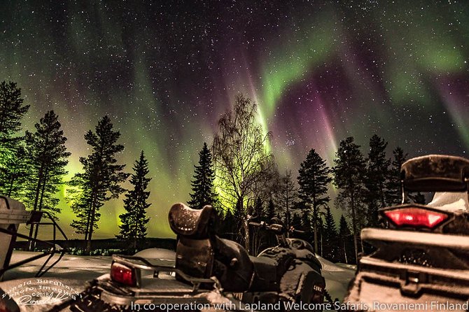Hunting Northern Lights by Snowmobiles - Photos with less stress: camera readiness and the guide’s aim