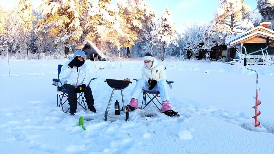 Ice Fishing Adventure in Levi with Salmon Soup - Warming up the classic way: salmon soup, hot drinks, and cookies