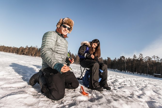 Ice Fishing Tour - Campfire comfort on the ice, teepee warmth and Finnish snacks