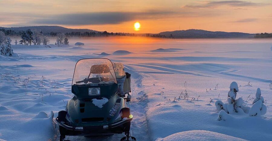 Icefishing and tasting in Lake Inari - Getting to Nellim by Car, Then Out on the Snowmobile Sleigh
