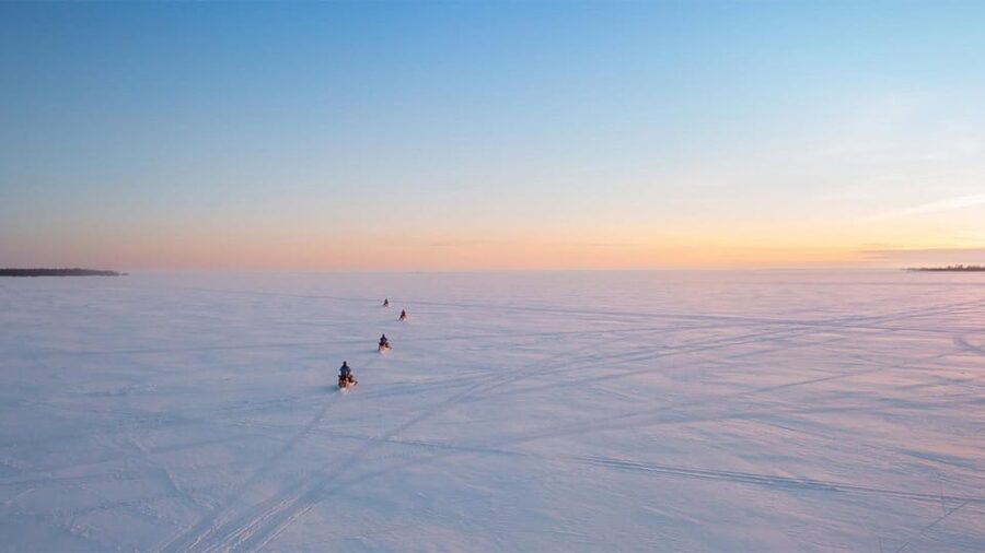 Kemi-Tornio: Ice Fishing Safari with Snowmobiles - From Kemi SnowCastle Resort to the frozen water