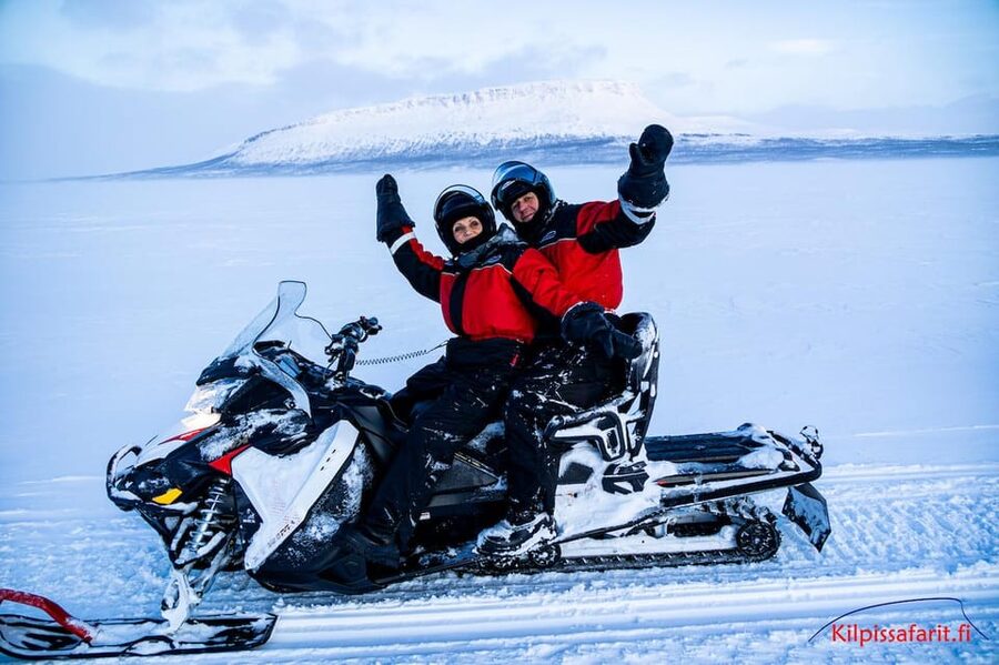Kilpisjärvi: Border of Three Countries Snowmobile Safari - Seeing three countries at once at Koltavuoma’s yellow border cairn