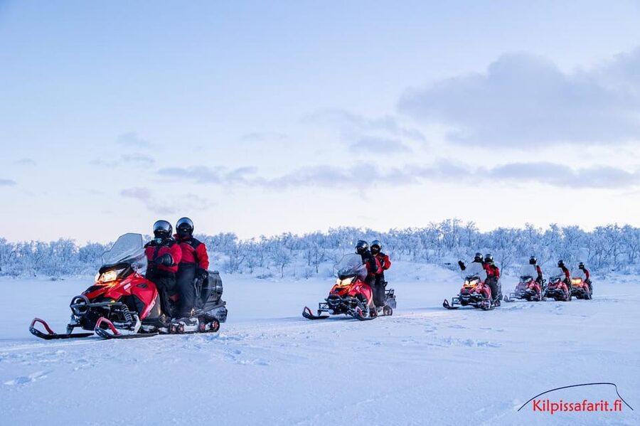 Kilpisjärvi: Border of Three Countries Snowmobile Safari - The warm break: hot drink, pastry, and guide photos