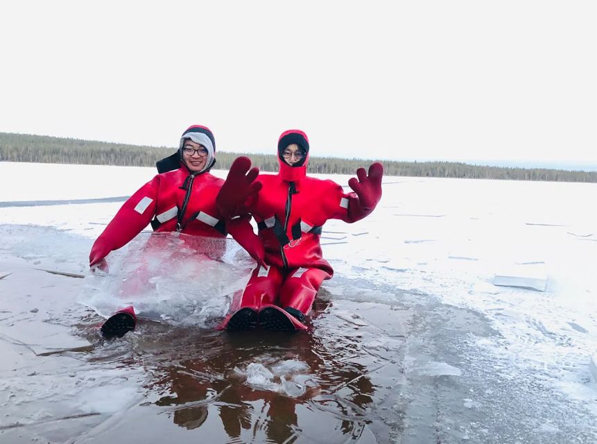Lapland: Ice Fishing, Floating & BBQ Snow Adventure - The BBQ warmth break: grilled salmon, marshmallow, and hot drinks