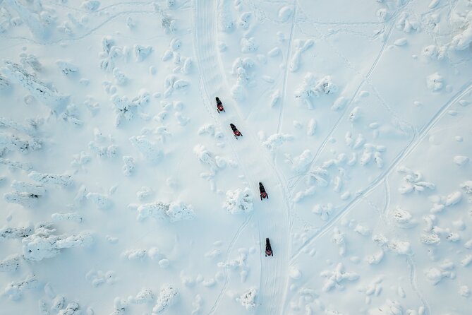 Lappish Lunch Break -Snowmobiling, ice fishing and tasty food - Stepping into winter at Safartica in central Rovaniemi