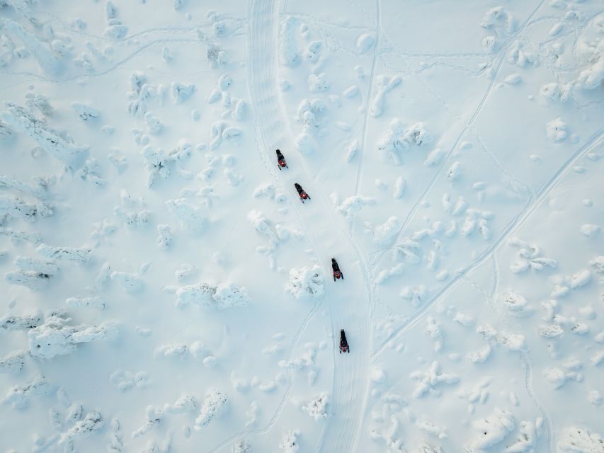 Levi: Snowmobile Safari with Ice Fishing and Outdoor Lunch - How the snowmobile safari works with 2-person machines