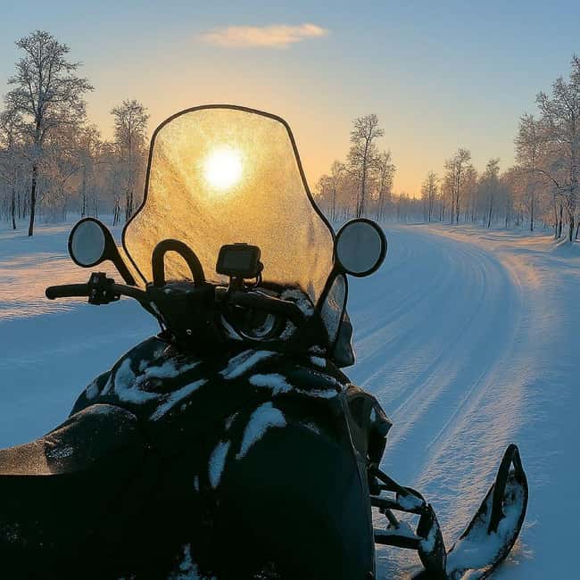 Levi: Twilight Snowmobile Safari & Stargazing Experience - Safety gear and the riding setup (you share one snowmobile)