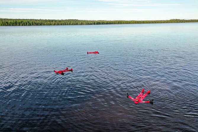 Midnight Sun Floating Experience in Forest Lake - The floating survival suit: the comfort piece that makes or breaks it