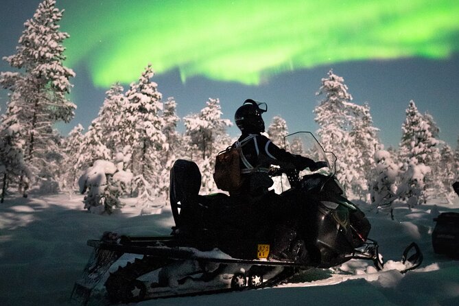Northern lights safari by snowmobile - The 4-hour experience flow: from town light to darker winter paths