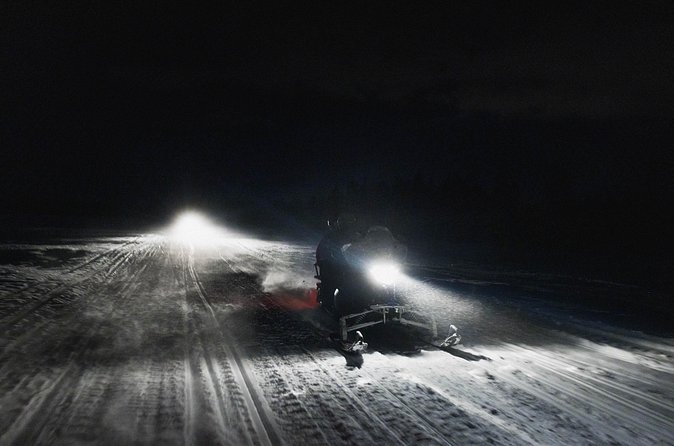 Northern lights safari by snowmobile - Auroras in Finland: what you’re truly paying for