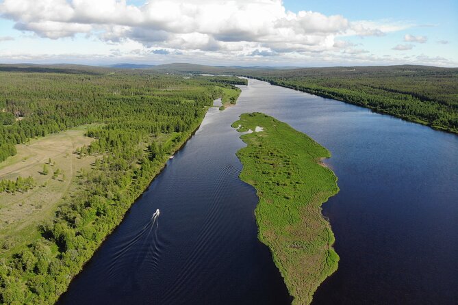 Private Guided Fishing Boat Tour in Rovaniemi - River scenery and the swim option in shallow water