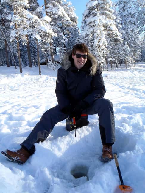 Pyhä: Ice Fishing Experience at Frozen Lake - When you catch something: how the open fire changes the whole outing