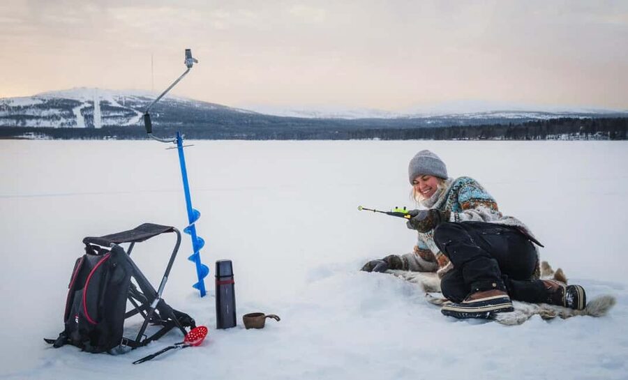 Pyhä: Ice Fishing Experience at Frozen Lake - Lucky Ranch Saloon meeting point and what to do before you start