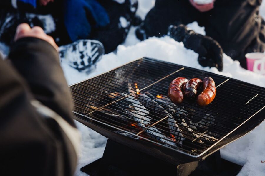 Rovaniemi: Arctic Circle Ice Fishing Experience - Hot Juice, Sausages, and a Campfire on the Ice
