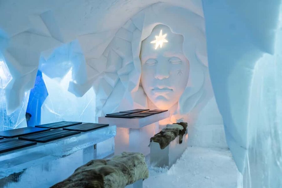 Rovaniemi: Arctic SnowHotel Tour and Dinner with Transfers - Dining by the fire at Kota, your warm escape route
