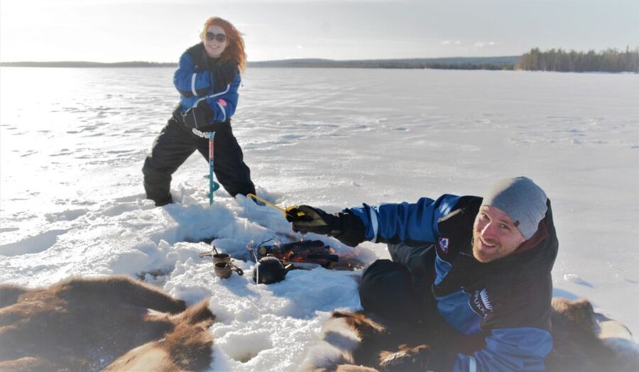Rovaniemi: Ice-Fishing like a Finn - The Hole, the Line, and the Waiting Game by Firelight
