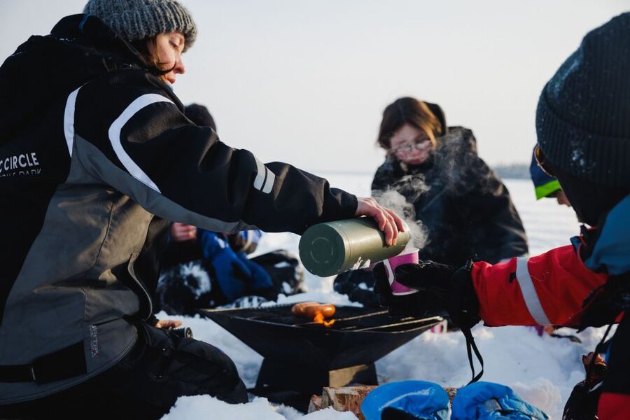 Rovaniemi: Ice Fishing & Snowmobile Safari Combo Day - Campfire Warmth, Sausages, and Ecosystem Stories