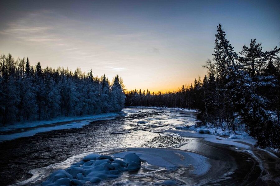 Rovaniemi: Nordic Forest Wilderness Adventure - Crossing a Wild River Bridge Before the Forest Climb