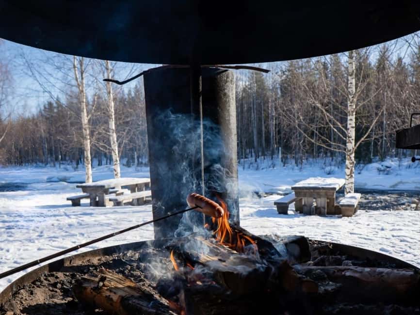 Rovaniemi: Small-Group Snowshoe Tour at Vikaköngäs & BBQ - Fire pause, hot drinks, and the grilled sausages BBQ