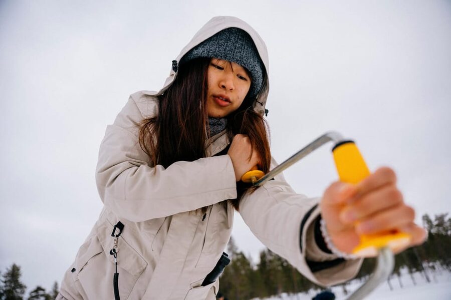Saariselkä: Ice Fishing Adventure - Hot Drinks, Fireplace Warmth, and Why Comfort Changes Everything