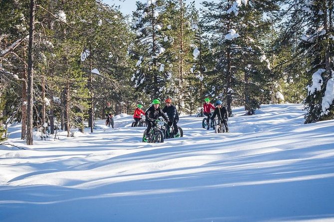 Scenic electric fat bike group ride in Rovaniemi - Entering The Experience at Hostel Café Koti and Roll Outdoors Garage