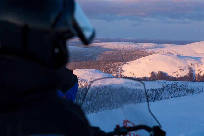 Scenic Snowmobile Safari in Saariselkä - The mid-route break: hot drinks, silent snow, and photo time
