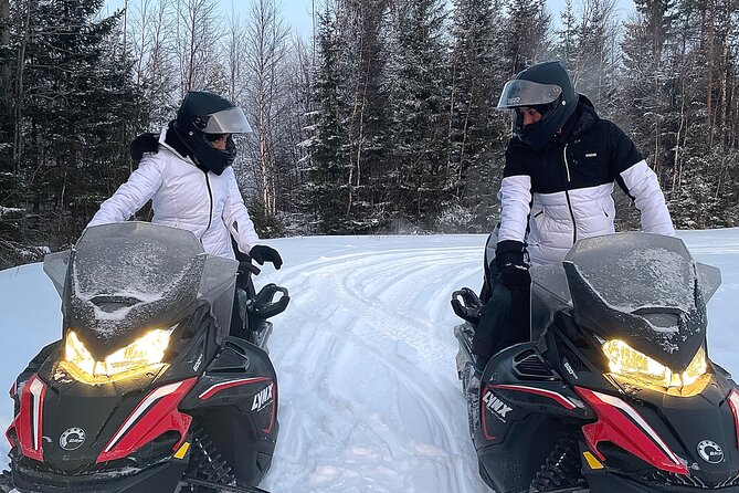 Snowmobile drive experience - Lapland by Snowmobile, With Safety and Warmth Built In