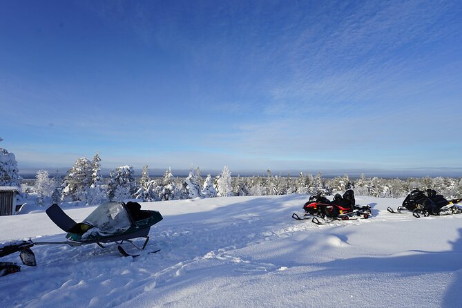 Snowmobile drive experience - What You Ride Through: Forest Trails, Frozen Lakes, and Fell Views