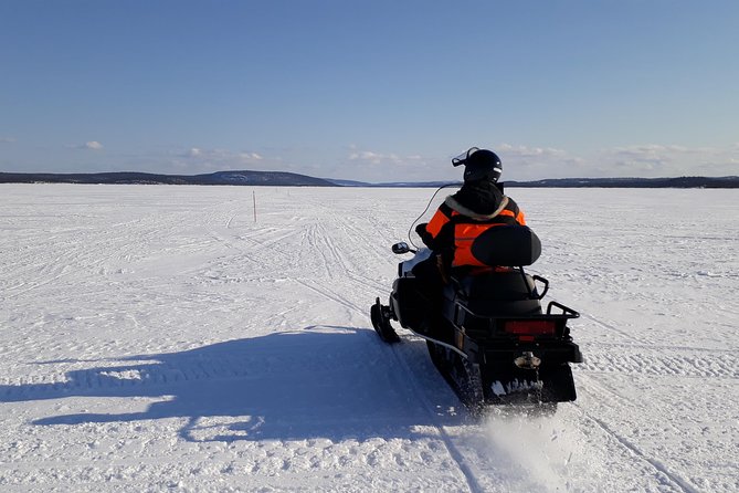Snowmobile Safari to Lake Inari, meet & feed Reindeers, Lunch - A 2-person snowmobile day around Lake Inari