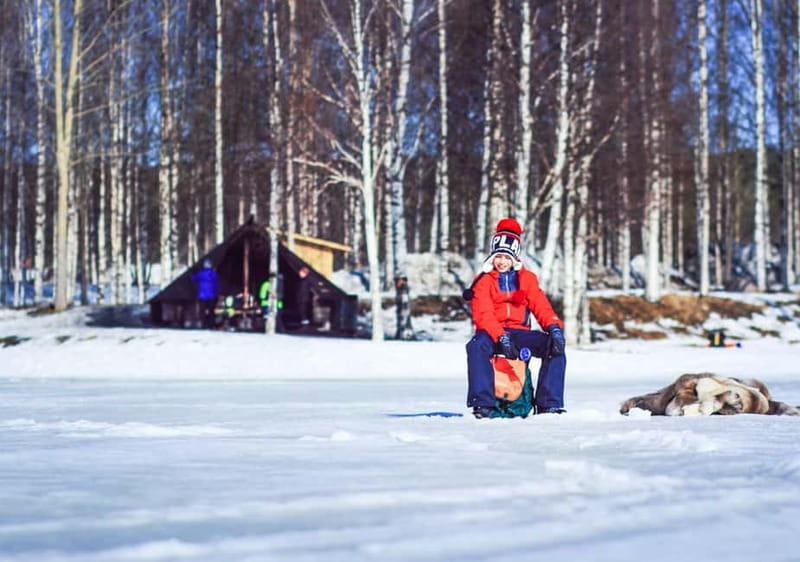 Snowshoe Trip for Ice Fishing in Saariselka - Ice fishing on a frozen lake, what you actually do