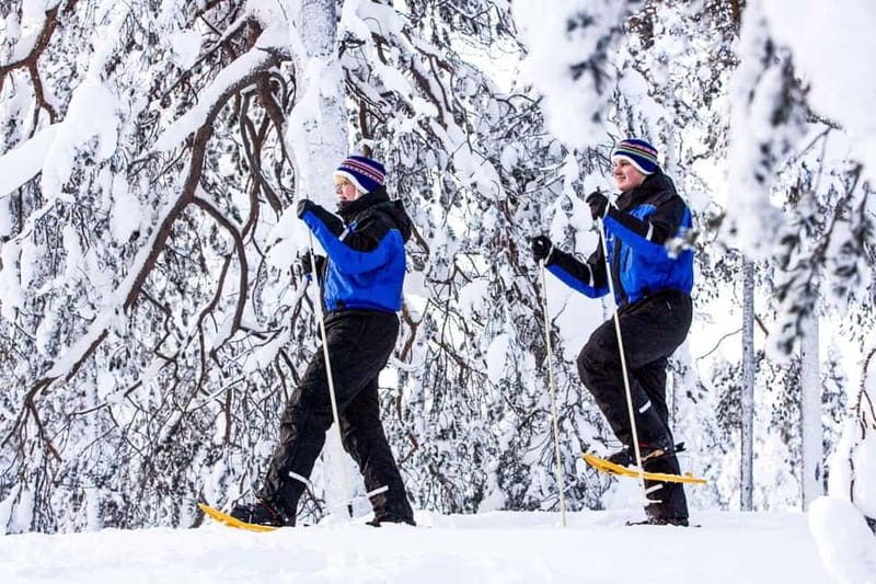 Snowshoe Trip for Ice Fishing in Saariselka - Open-fire BBQ lunch in a cozy hut, with Finnish comfort food