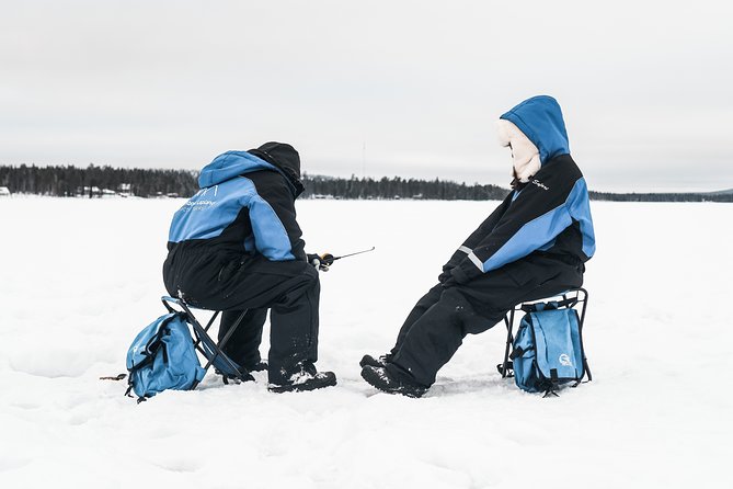 Snowshoeing and Ice Fishing Tour - Ice fishing on the frozen lake: drilling, patience, and standing still