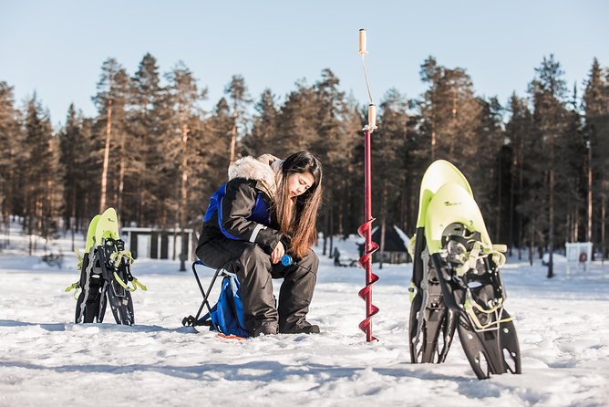 Snowshoeing and Ice Fishing Tour - The warm-up on shore: hot drinks, Finnish snacks, and cooking by fire