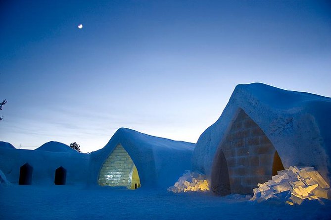 To the Kingdom of Snow and Ice – Full day snowmobile safari to ice hotel - Lunch in a Kota Teepee: Glow-Fried Salmon and a Warm Reset