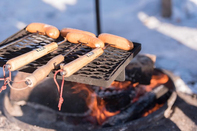 Wilderness Survival Tour - Winter - The campfire snack break: warm food, Finnish style