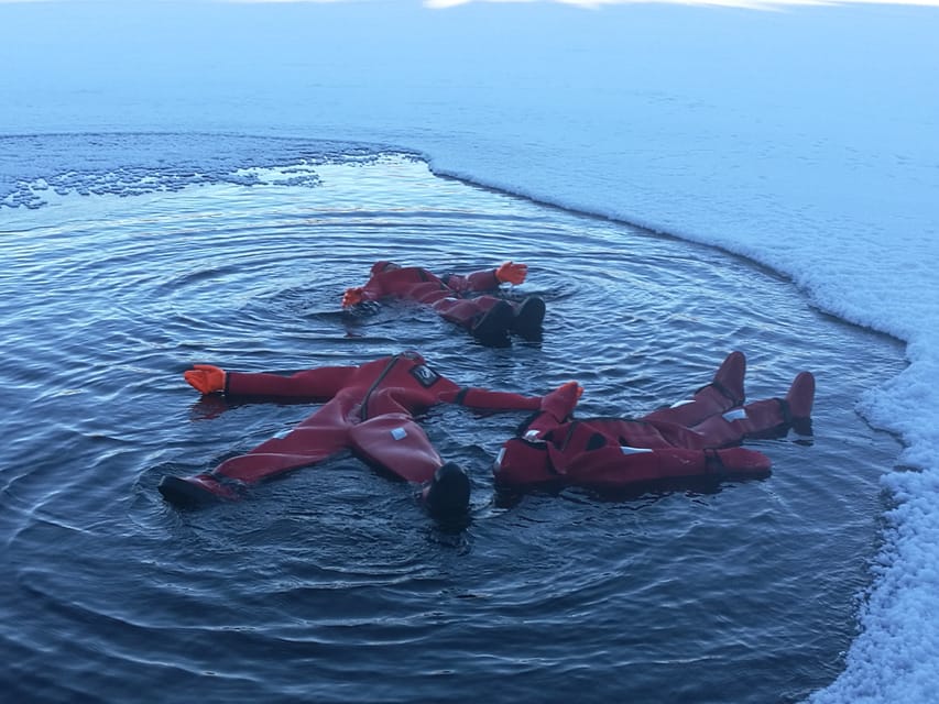 Ylläs: Lake Ylläsjärvi Ice-Floating Experience - Getting Into the Ice Hole: Safe Coaching and Body Position Tips